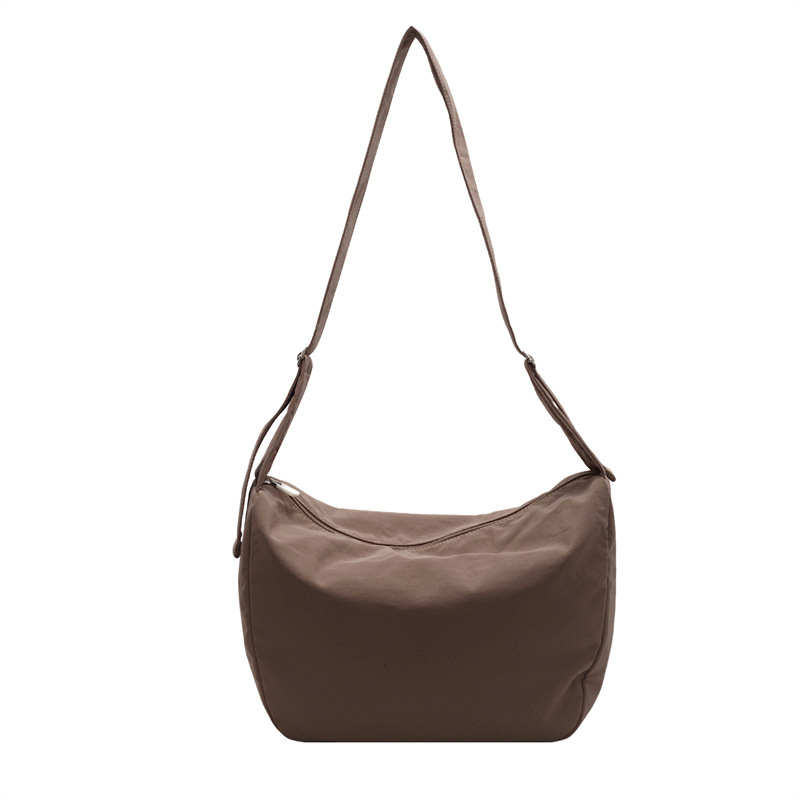 Portable, casual, large-capacity bag for women, new summer 2025 Korean style, fashionable and versatile travel bag, commuting single-shoulder bag Item Picture