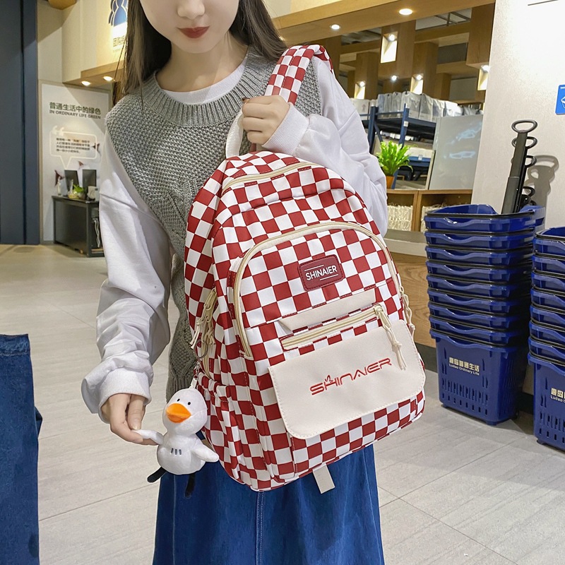 New autumn and winter ins checkerboard backpack for girls, Korean version for junior and senior high school students, large-capacity Haraju-style backpack details Picture