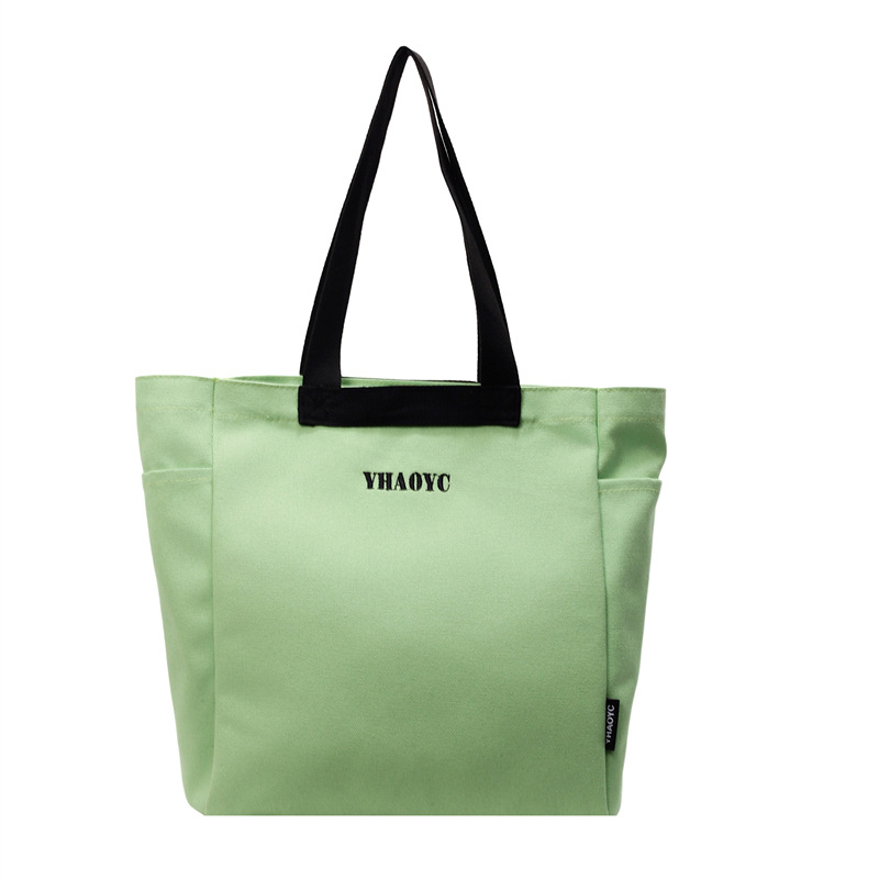 Popular new canvas bags for women's commuting to work, large-capacity single-shoulder bags, simple tote bags, and hand-held canvas bags for classes Item Picture