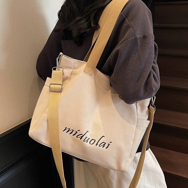 ins Korean style niche design canvas bag, women's high-end large bag, single-shoulder bag, large capacity, versatile commuter tote bag full figure
