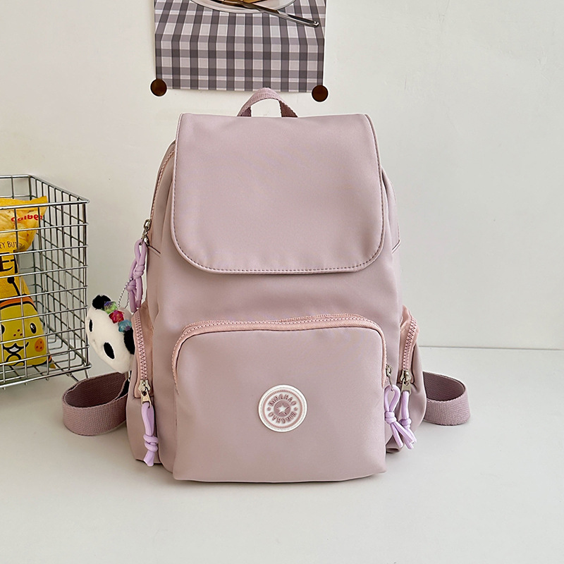 A new high-appearation-level backpack with a large capacity for casual use, a lightweight and lightweight schoolbag for primary school students, and a children's travel and study tour details Picture