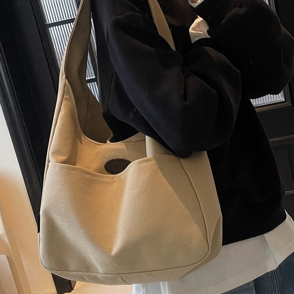 Large-capacity simple fabric bag, 2025 new Korean style, fashionable and versatile single-shoulder bag, casual commuting handbag for work Application Scenario