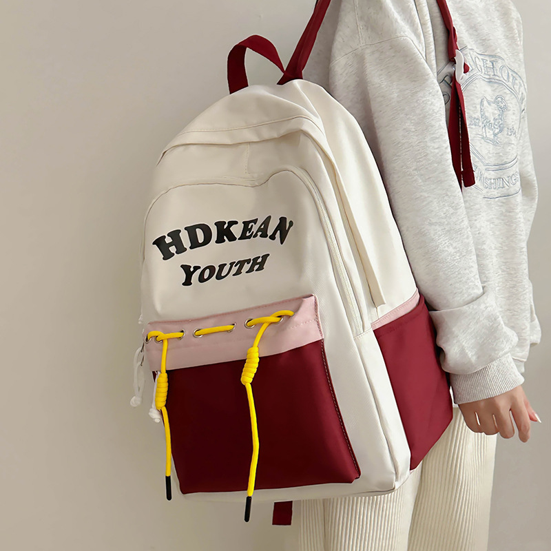 Casual couple backpack, simple and large-capacity student backpack, Korean style, fashionable and versatile, high appearance level college student schoolbag full figure