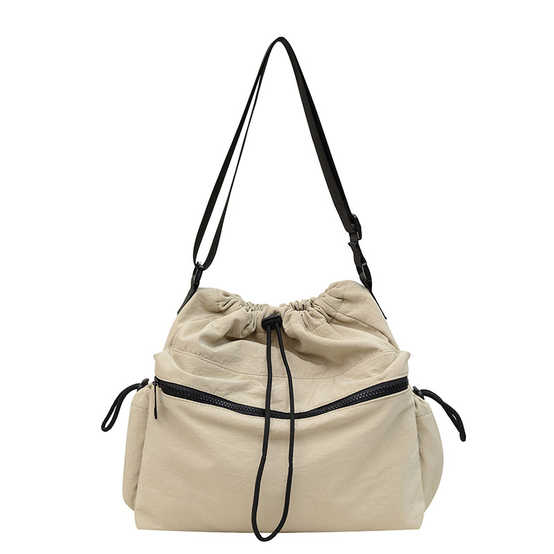 A new, stylish, large-capacity, soft, lightweight and versatile single-shoulder, underarm drawstring, pleated and crossbody women's bag Item Picture