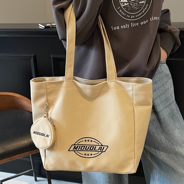 New embroidered canvas bag, versatile, thickened single-shoulder, large capacity, simple student commuting, hand-held tote bag for class, trendy full figure