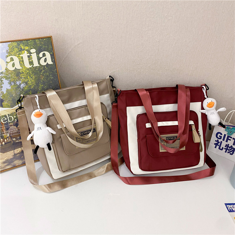 New large-capacity canvas bag for after-school tutoring, dual-purpose handbag, girls' schoolbag, canvas crossbody bag for junior high school and senior high school students full figure