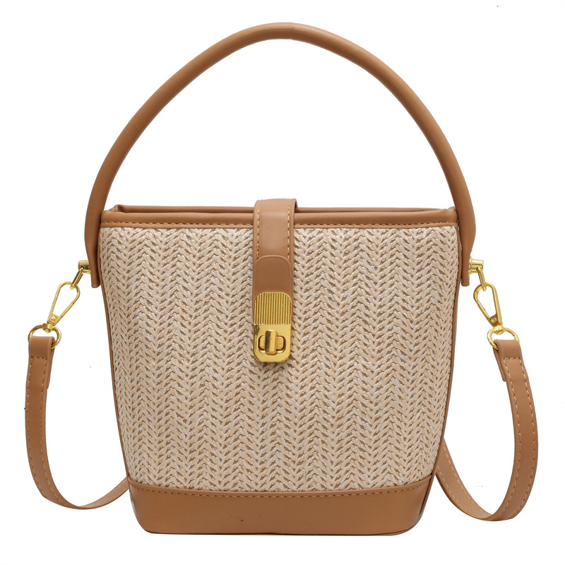 The 2024 new straw-woven bag for women is a trendy solid-color niche design crossbody bag and a versatile hand-held bucket bag Item Picture