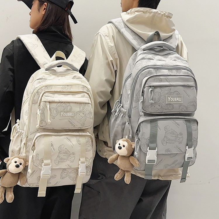 Little bear printed schoolbag for female junior and senior high school students. It's a niche, high-appearance-level, ins style forest-themed casual large-capacity backpack full figure