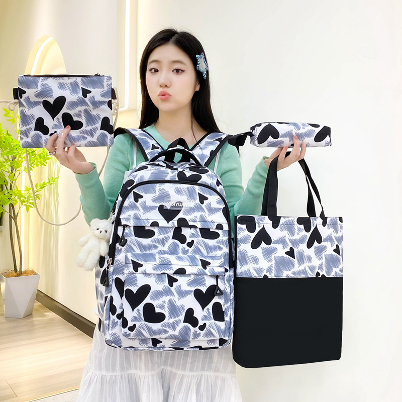 Dopamine girl, cute backpack, high appearance level, college student backpack, schoolbag, junior high school girl, large capacity four-piece set Application Scenario