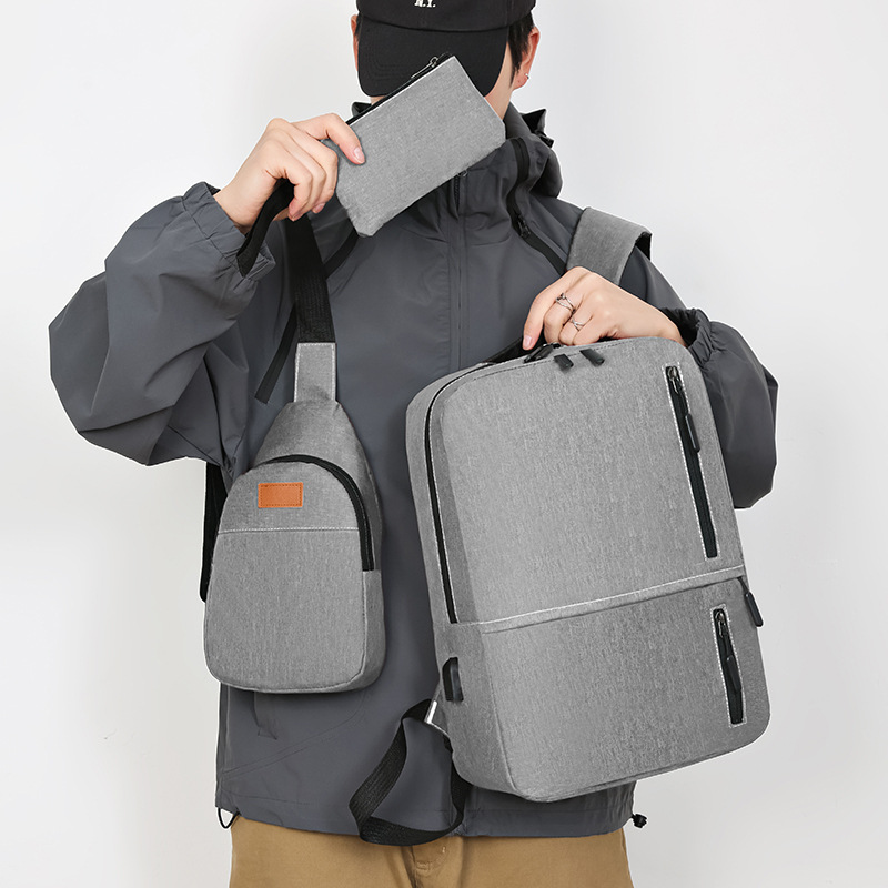 Cross-border solid-color student schoolbag, casual backpack, men's simple backpack, three-piece set, multi-functional USB computer bag full figure