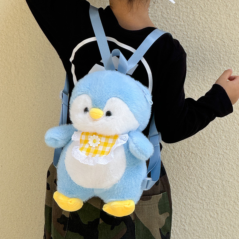 New cartoon apron, penguin backpack, cute and girlish plush toy, penguin doll, coin purse wholesale Application Scenario