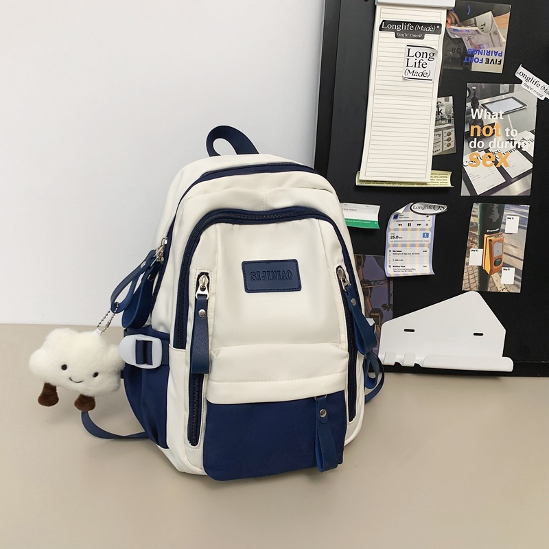 A simple and elegant backpack for women, a large-capacity backpack with contrasting colors, a new casual schoolbag for junior and senior high school students, for student outings details Picture