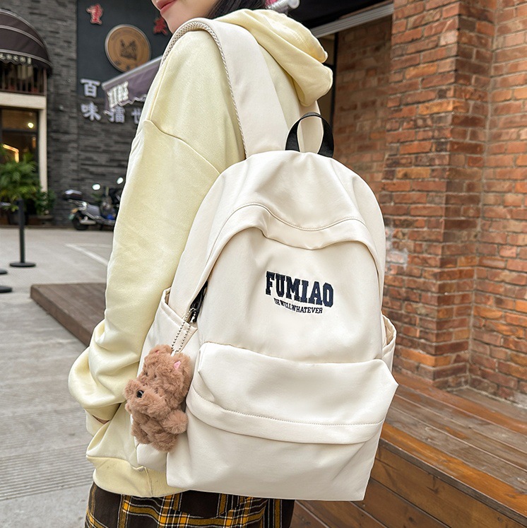 2024 New minimalist letter style middle school backpack, Japanese trendy brand college student couple travel backpack full figure