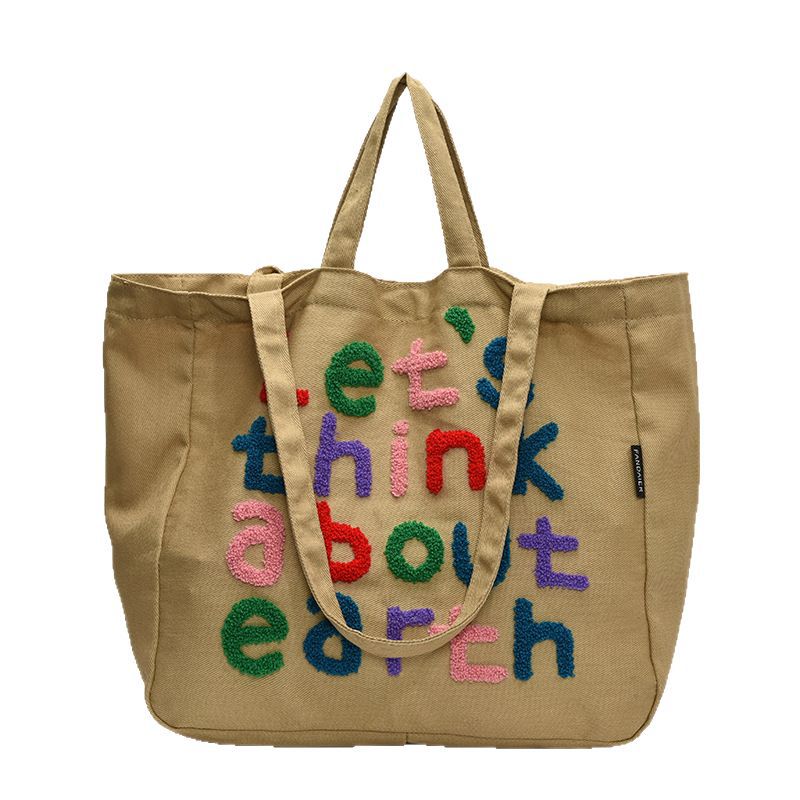 The 2025 new high-appearance, large-capacity commuter tote bag for women, a trendy single-shoulder bag with colorful letters, and a versatile underarm bag Item Picture