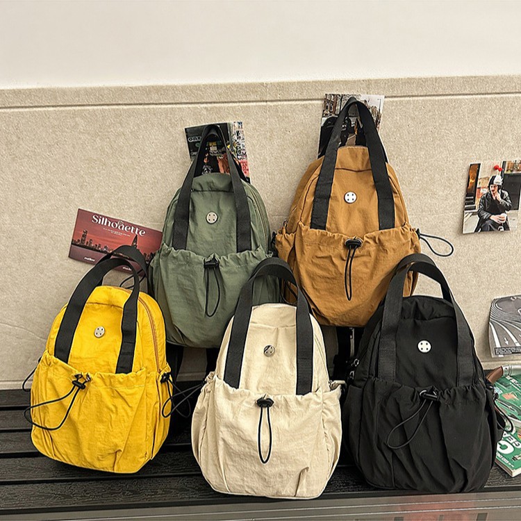 New trendy men's lightweight backpack, nylon fabric bag, women's high appearance level, work commuting single-shoulder crossbody bag wholesale Application Scenario