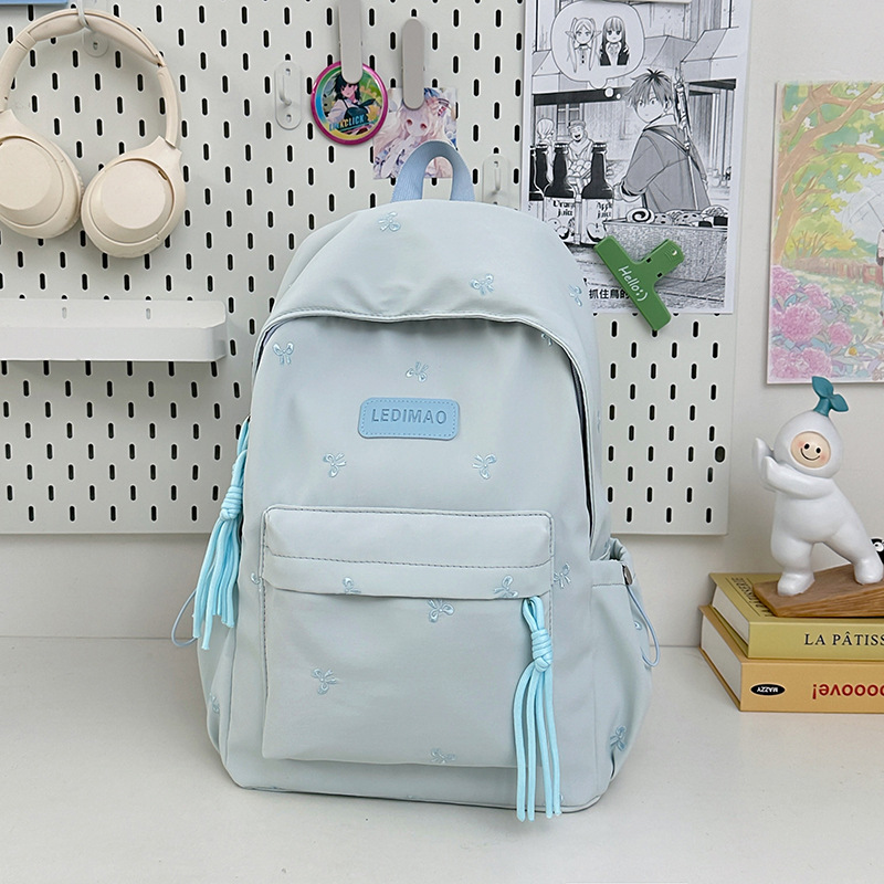 Student solid color schoolbag, high appearance level, new backpack, large capacity, simple, casual and versatile, 2025 Application Scenario