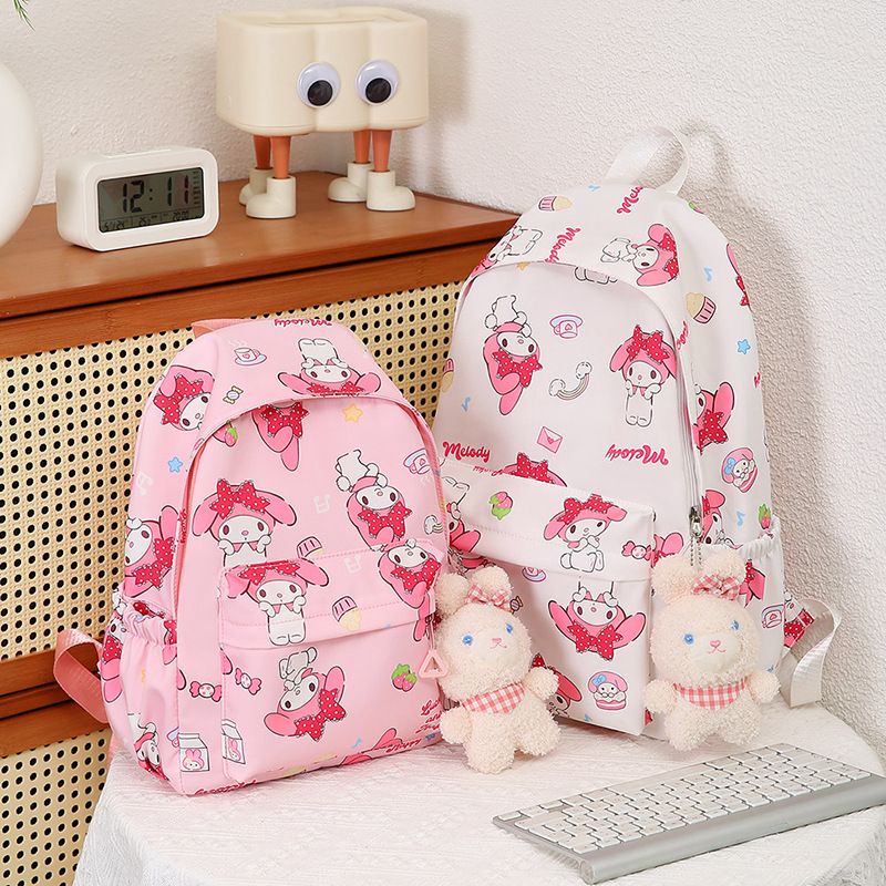 Cute cartoon schoolbag, waterproof campus backpack, printed graffiti, large capacity for primary school students, high appearance level backpack for girls full figure