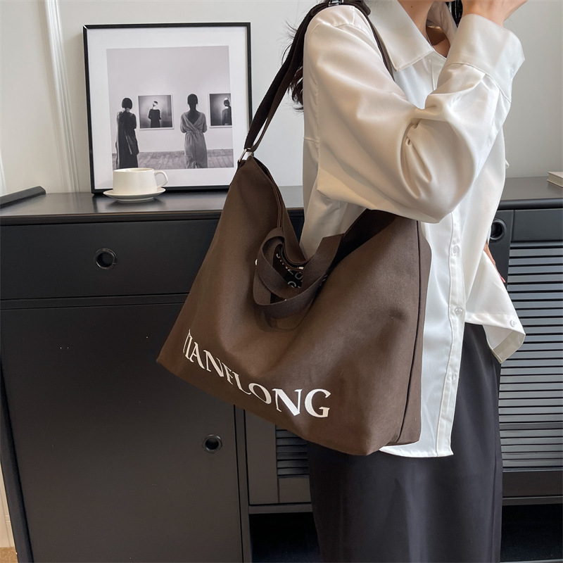 American retro large-capacity bag, casual and artistic style for women, tote bag for university classes, daily commuting canvas bag details Picture
