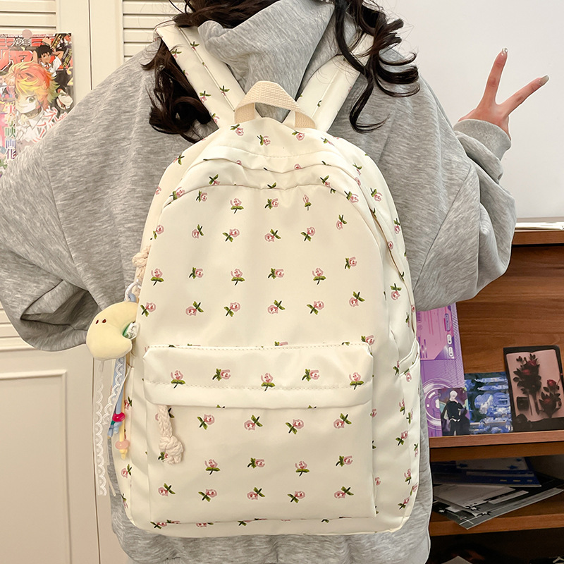 A cute Japanese-style double-shoulder backpack for junior and senior high school students, a floral puppy backpack for college students, and a large-capacity schoolbag Specification drawing