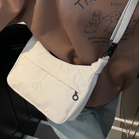 Fashionable and casual saddle Bag 2025 Spring New Korean-style trendy fabric bag, outdoor light and simple crossbody bag details Picture