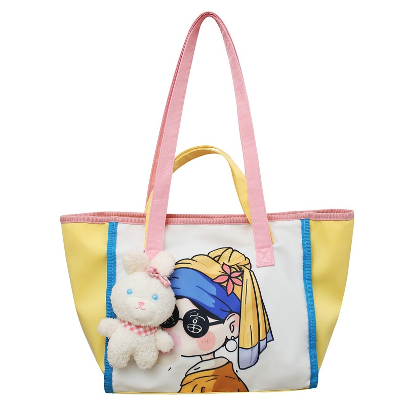 A versatile cartoon new cute large-capacity class handbag, student shoulder bag, printed graffiti, fresh tote bag Item Picture