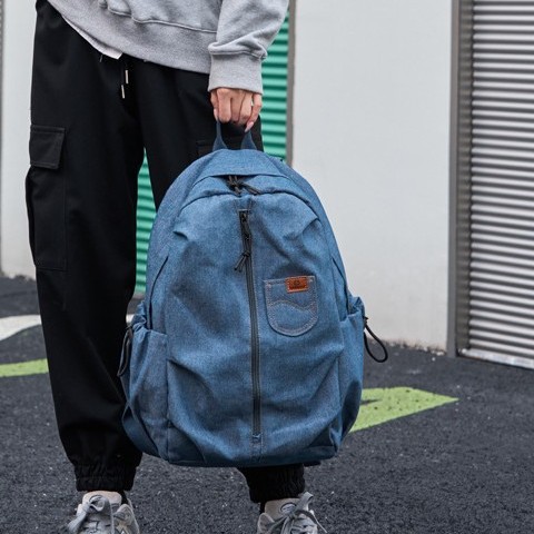 The new denim large-capacity schoolbag, student backpack, casual travel and outdoor backpack design is suitable for both men and women full figure