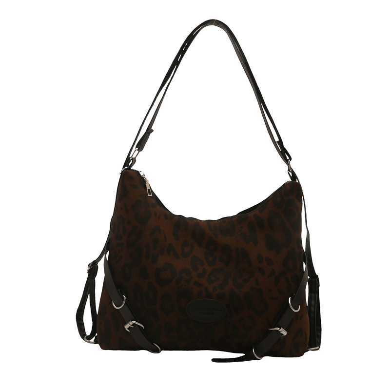 A new 2024 Korean-style retro leopard print tote bag for women, a large-capacity backpack with a college style and a single-shoulder crossbody bag for commuting Item Picture