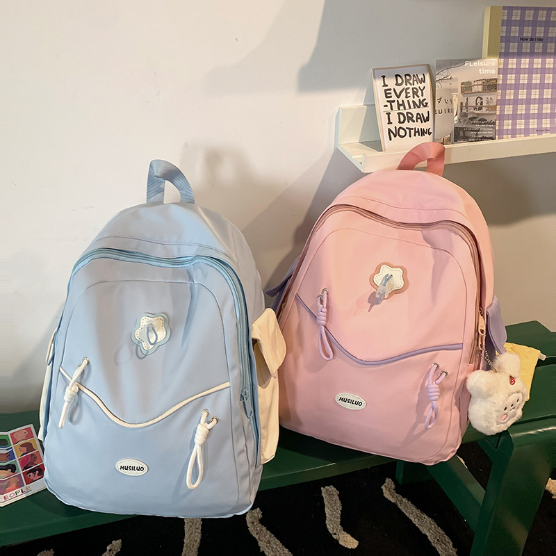 Large-capacity schoolbags for junior and senior high school students, fashionable and simple backpacks, new cute travel bags full figure