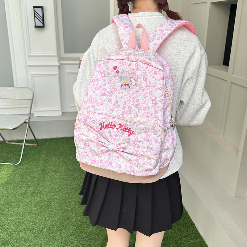A sweet and cute large-capacity backpack with floral prints for cross-border girls. A cartoon backpack for junior high school and primary school students details Picture