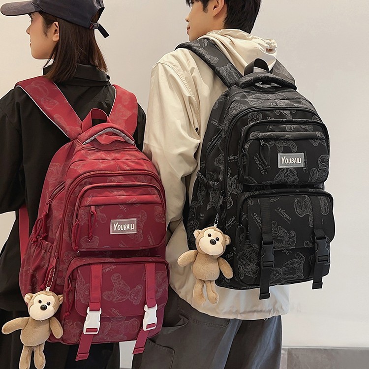 Little bear printed schoolbag for female junior and senior high school students. It's a niche, high-appearance-level, ins style forest-themed casual large-capacity backpack details Picture
