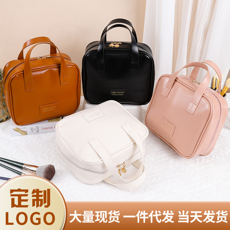 A popular leather shell makeup bag with a high level of appearance, portable lipstick and makeup brush storage bag, and a large-capacity waterproof storage bag full figure