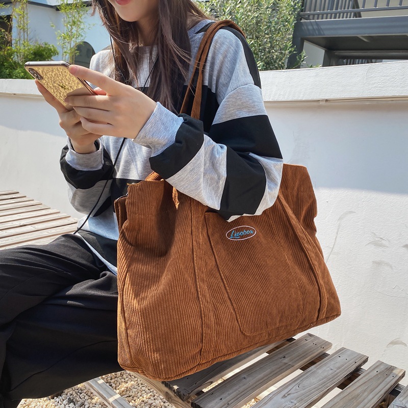 Large-capacity tote bag for women, 2022 new corduroy laid-back style hand-held crossbody bag, single-shoulder bag for college students' classes details Picture