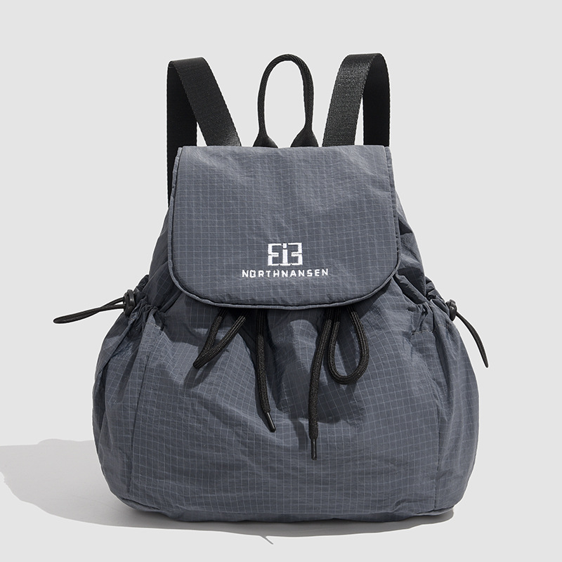 "Fashion 2025 Spring Mini Backpack for Women: A laid-back style solid-color casual outdoor bag with a high-quality small size. Application Scenario