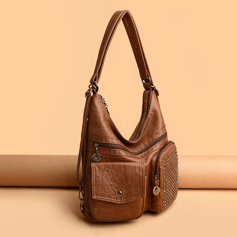 The new PU soft leather women's bag is versatile and fashionable. It's a multi-layered small bag with rivets and a casual single-shoulder crossbody bag Specification drawing