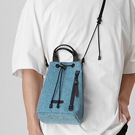 This is a new Spring/Summer 2025 stylish, high-end, and niche multi-color bucket bag for both men and women. It is a versatile and fashionable backpack full figure