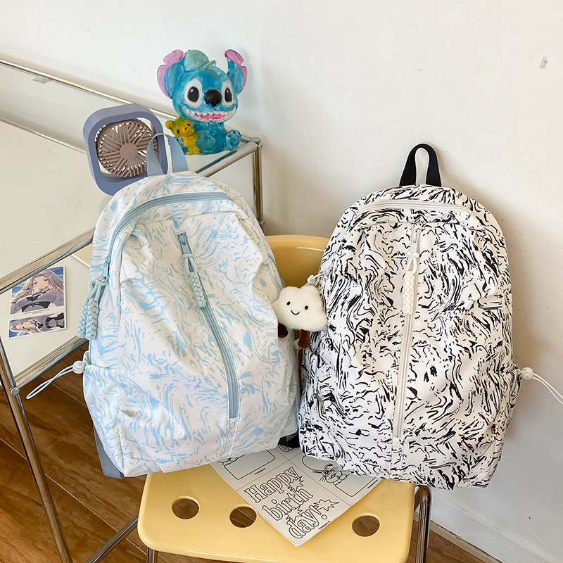 Graffiti high appearance level schoolbag, girls' junior high school backpack, high school and college students' campus ultra-light new simple backpack full figure