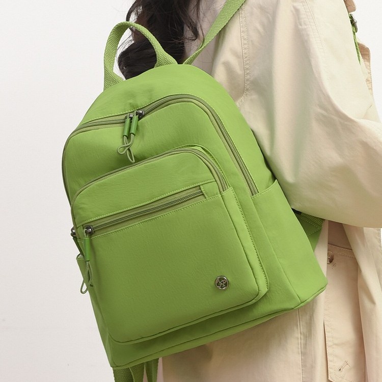 Fashionable and casual small backpack travel bag, trendy and versatile, water-resistant nylon fabric bag, simple and elegant backpack for women to go out full figure