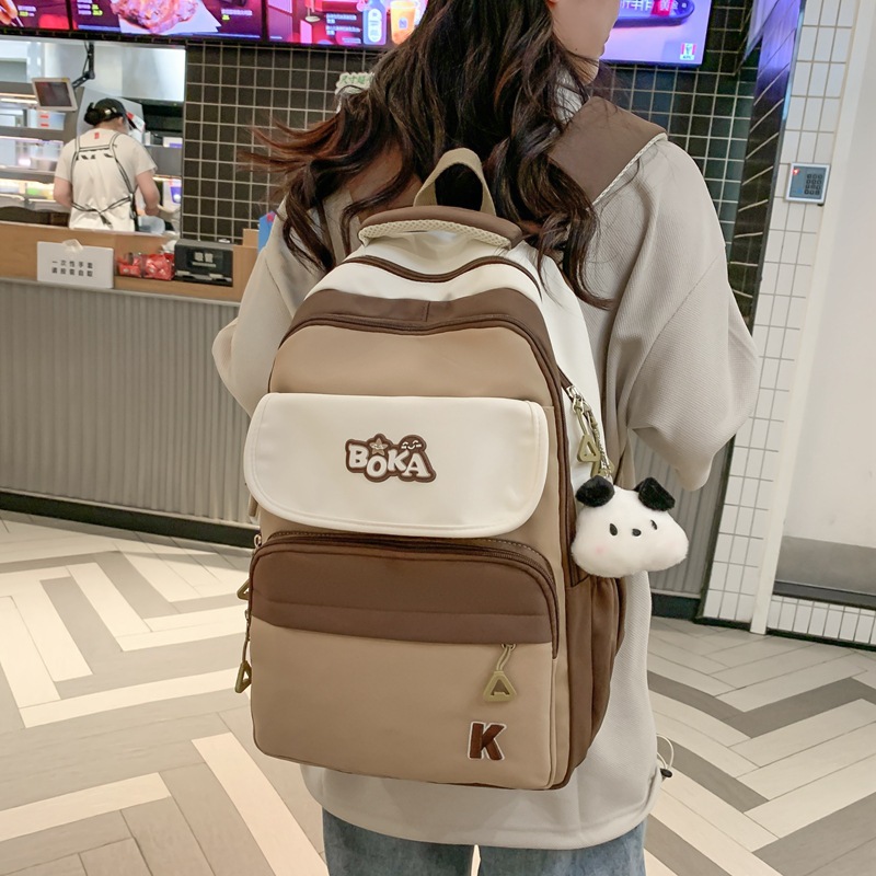 A large-capacity, multi-compartment, lightweight and simple backpack for female college students, a travel computer backpack for junior high school and senior high school students Specification drawing