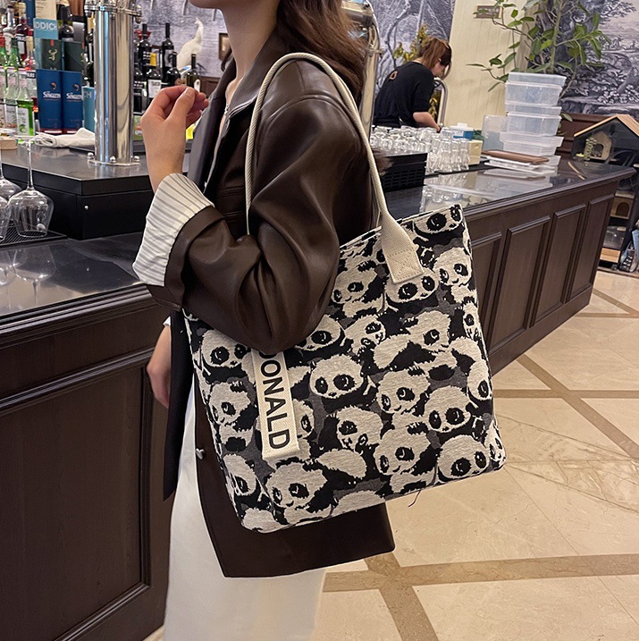 Cartoon large-capacity canvas bag for women, 2024 new style fashionable single-shoulder commuter bag, versatile student tote bag for class full figure