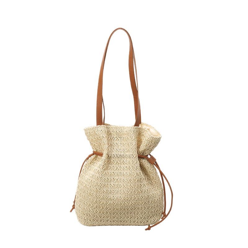 Trendy casual large-capacity straw woven bucket bag for women 2025 new style drawstring woven seaside vacation beach single-shoulder bag Item Picture