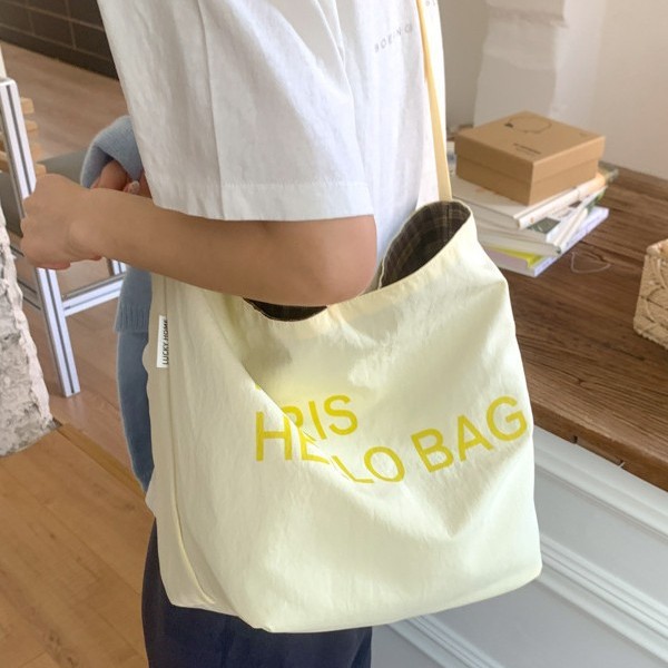 The Korean version of the ins large bag women's 2025 new style canvas tote bag, artistic and retro, large capacity single-shoulder crossbody handbag full figure