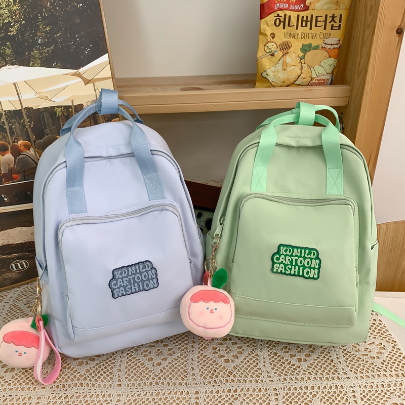 Mini backpacks for college students, small schoolbags for women's commuting and outings, lightweight small backpacks for girls, Korean outdoor travel bags for young girls full figure