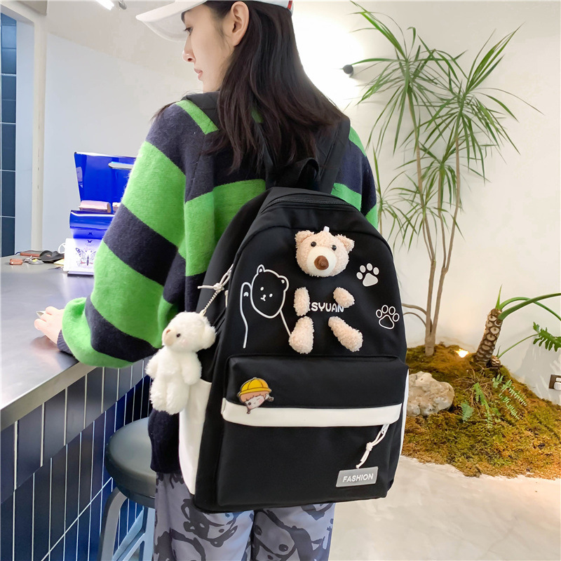 New large-capacity student backpack for girls, fashionable and simple nylon shoulder backpack, cartoon bear student backpack full figure
