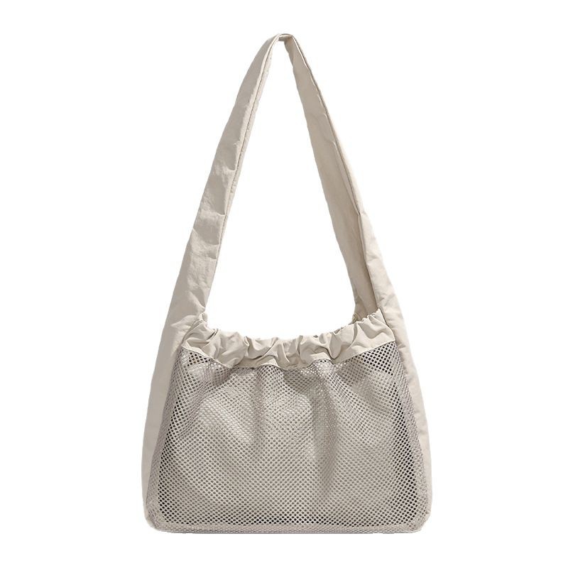 The 2025 new soft and lightweight hollowed-out mesh nylon women's bag is a casual, simple and fresh pull-out single-shoulder tote bag Item Picture