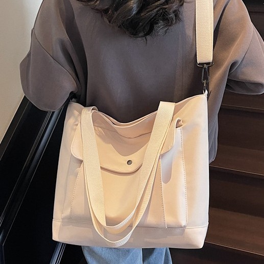 Hong Kong-style retro casual large-capacity tote bag for women 2025 new fashion trend hand-held cloth bag simple single-shoulder bag details Picture