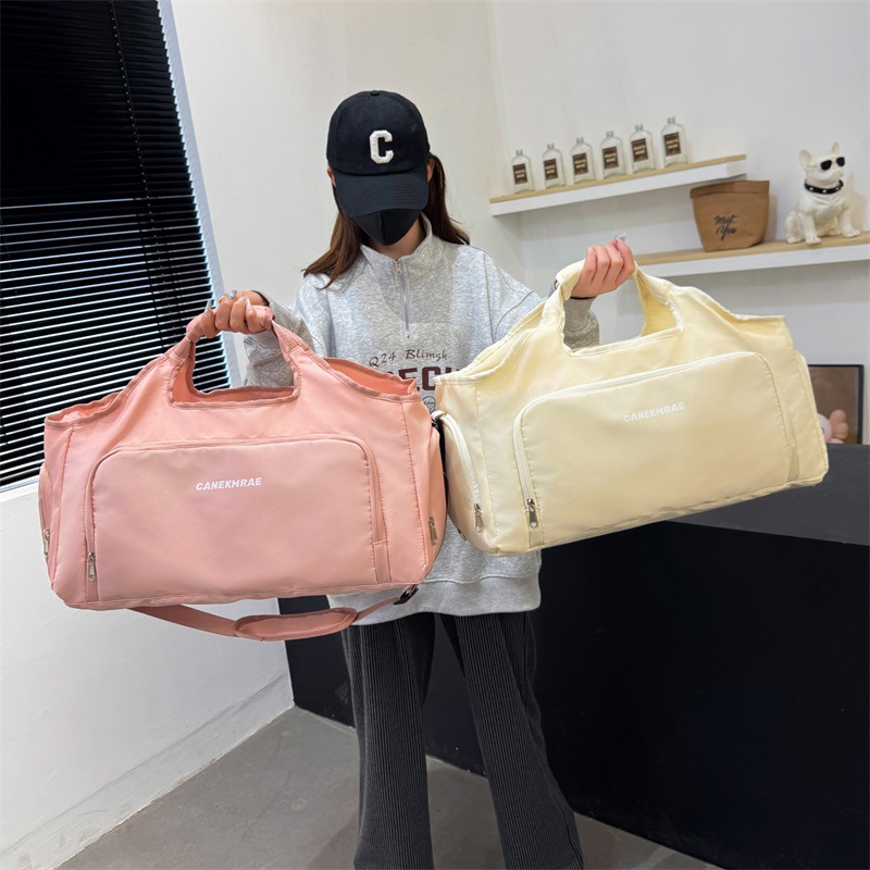 Cross-border sports and fitness bag, large-capacity dry-wet separation short-distance travel bag, solid-color simple and casual crossbody carry-on bag full figure
