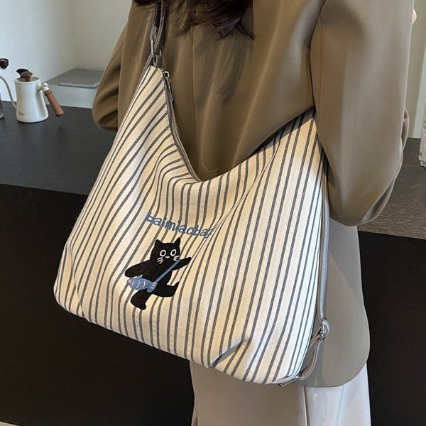 Korean-style backpacks, women's tote bags, striped canvas single-shoulder bags, crossbody bags, cute little cats, and fresh backpacks details Picture
