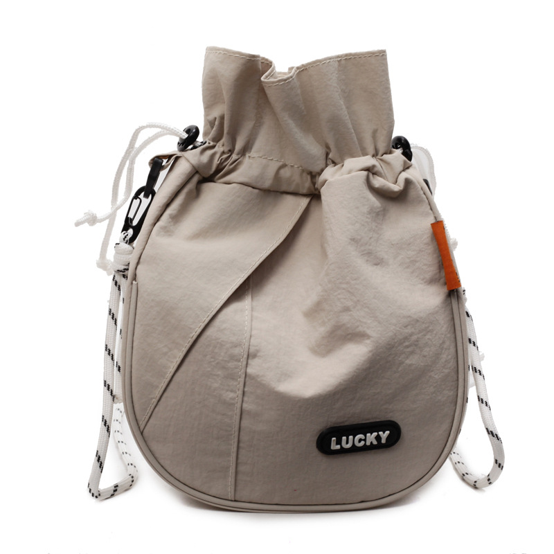 Trendy new 2025 solid color new drawstring bag phone case, loose change storage bag, lightweight outdoor single-shoulder crossbody bag Item Picture