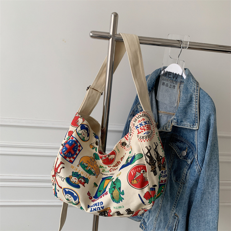 Artistic style casual crossbody bag, retro and personalized printed canvas bag for women, large-capacity tote bag for college students, women's bag full figure