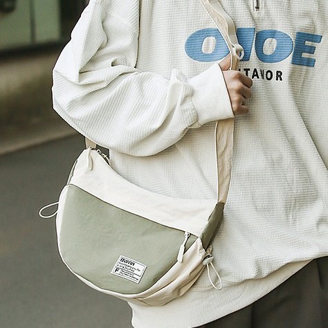 Japanese-style casual crossbody bag, fashionable canvas sports single-shoulder phone bag, 2025 new trendy dumpling bag, travel backpack details Picture